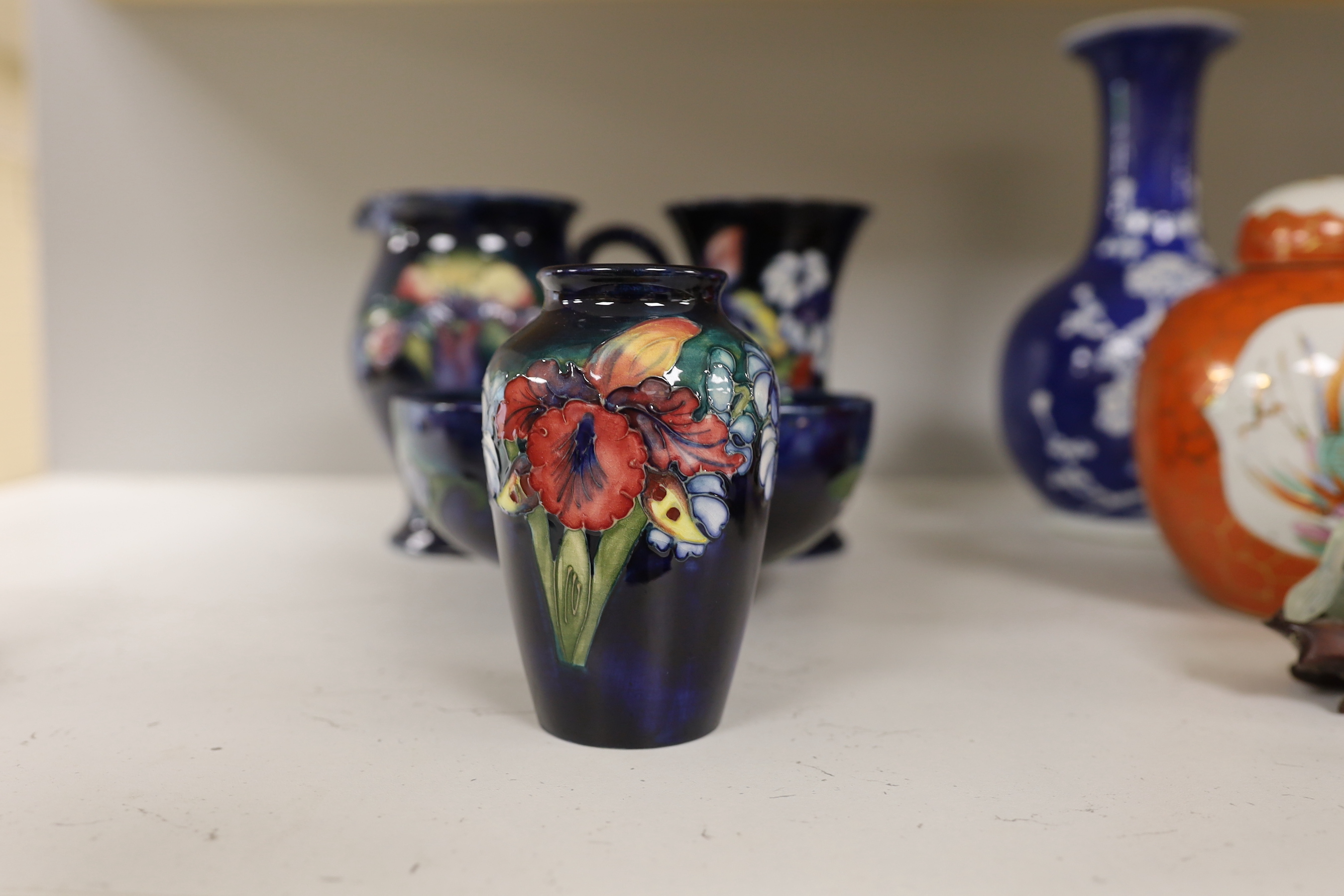 Four pieces of Moorcroft pottery, tallest 15cm